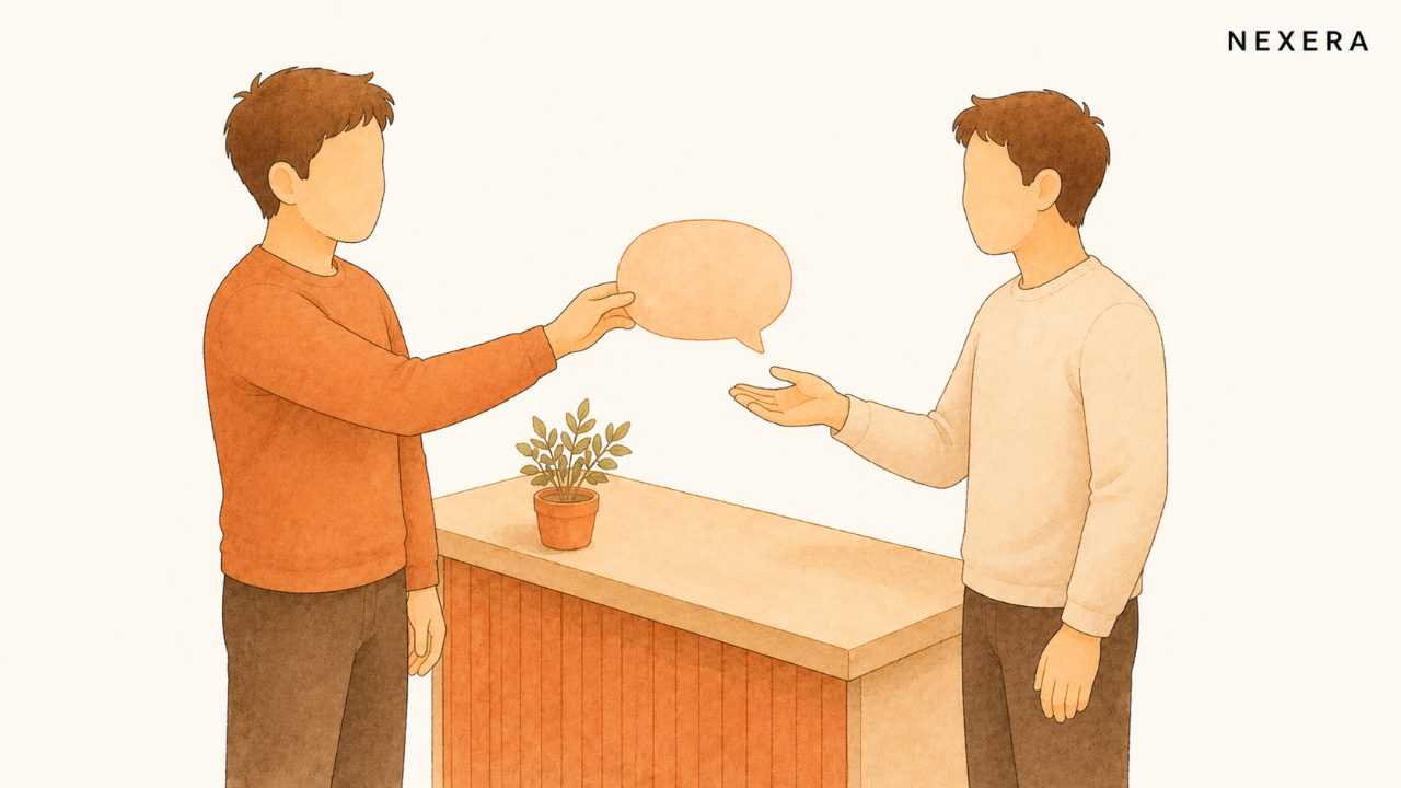 One faceless man handing a speech bubble to another across a counter